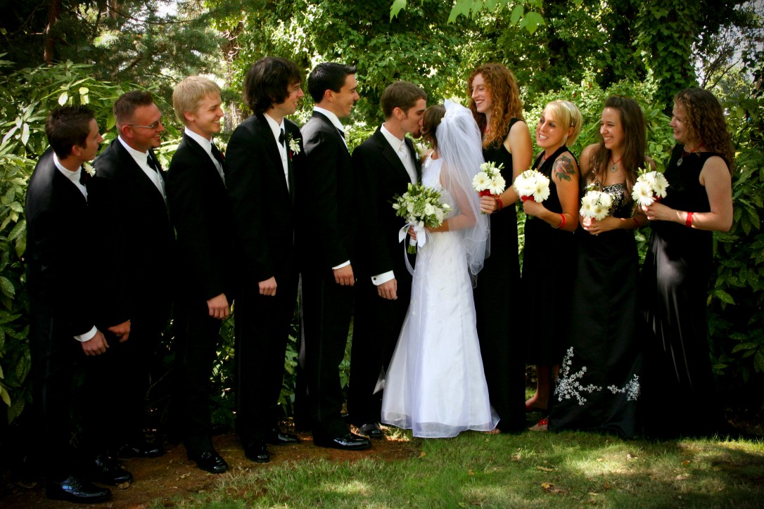 wedding party - bridesmaids and groomsmen in black